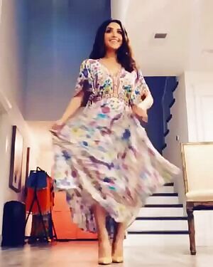 This MILF dancing.. wish her dress covered less...