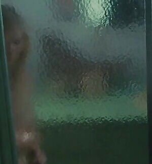 Steamy Shower Sex with Kirsten Dunst while squeezing and sucking on her low hanging tits would be fucking hot
